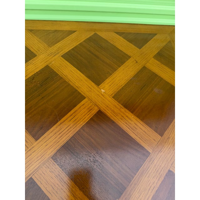 Louis XV–style square game or card table featuring a handsome geometric parquetry top framed by a molded edge. The table...