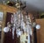 1940s Hollywood Regency Gilt & Verdigris Bronze/ Tole/ Crystal Pendant Chandelier For Sale - Image 10 of 12