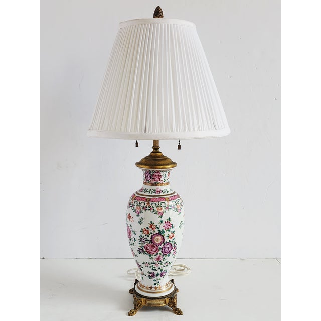 Antique Chinese Export Famille Rose porcelain table lamp. The lamp features a beautiful design of enamel handpainted...