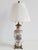 Antique Chinese Export Famille Rose porcelain table lamp. The lamp features a beautiful design of enamel handpainted...