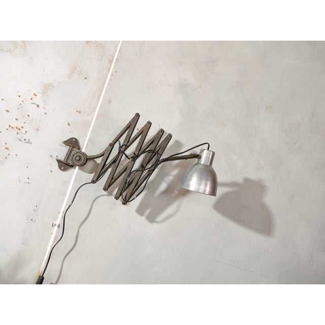 Antique scissor lamp by hala. It's got great weathered patina. This light is an original vintage item, meaning there are...