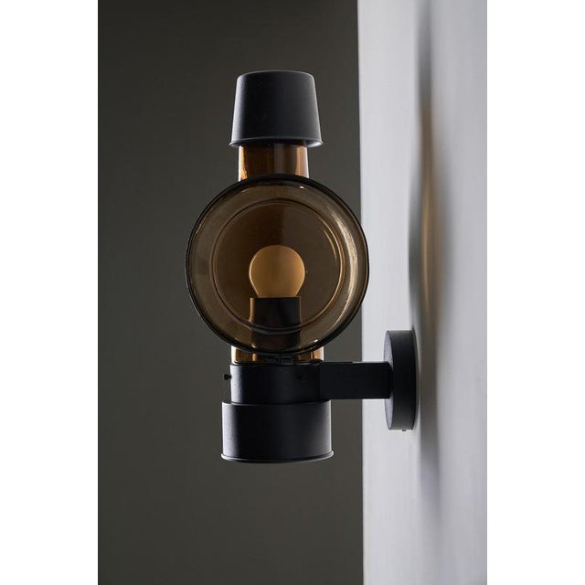 This outdoor wall lantern is from the "Boom" collection, the traditional lighting division of the German manufacturer...