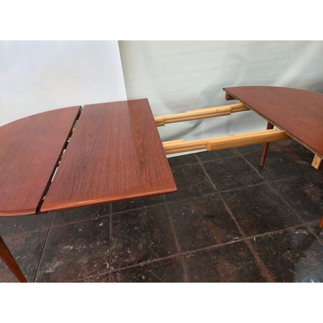 Mid- Century Danish Modern Teak Dining Table Round Opens Oval 105 Inches With 3 Leaves For Sale - Image 15 of 18