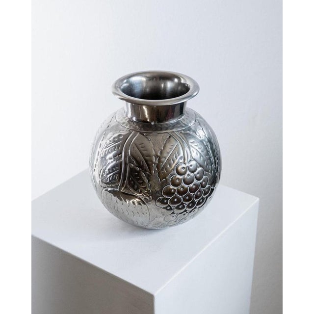 This vintage Italian vase from the 1960s is a beautifully decorative example of handcrafted metalwork. Made from brass...