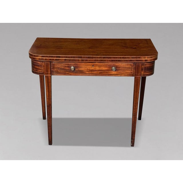 Wonderful Colour Late 18th-Century George III Mahogany & Satinwood String Inlaid Fold-Over Tea Table A superb late 18th-...