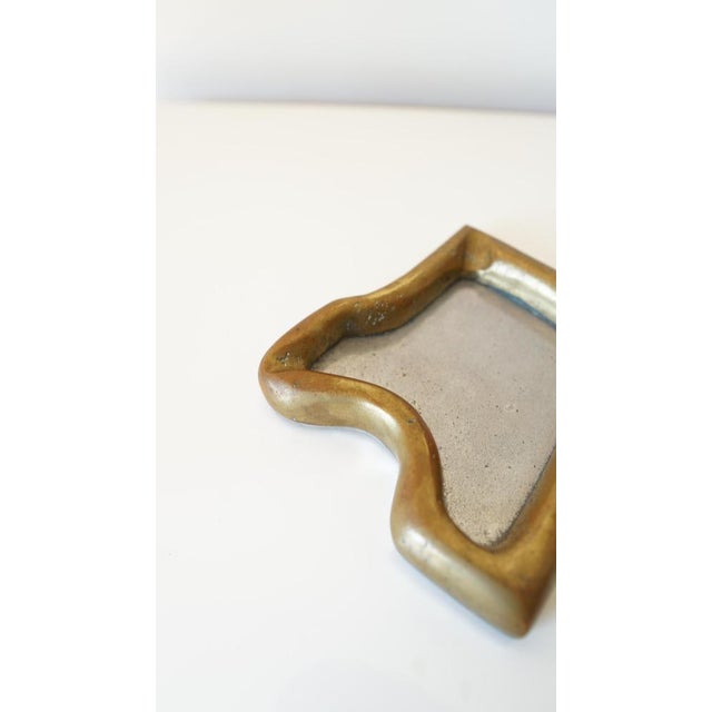 Asymmetrical brass ashtray – brutalist design by David Marshall – vintage. Sculptural and utilitarian piece emblematic of...