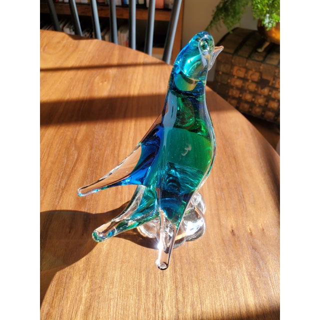Stunning mid-century blown glass bird figure. Displayed in sunlight the glass colors take on a deep jewel-tone. Sweet...