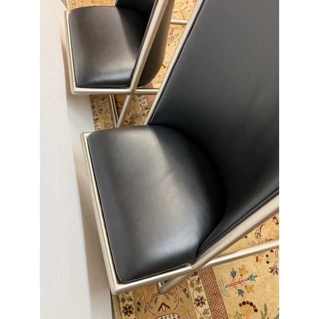 Design Plus Gallery presents a Pair of Black Leather Scissor Chairs by Ward Bennett for Brickell Associates. The Ward...