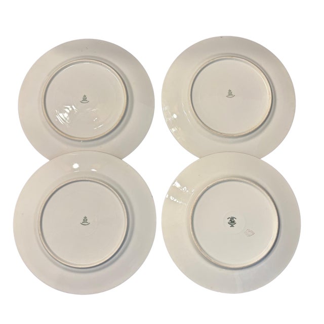 This is a set of 4 gold encrusted porcelain service plates (chargers) made by Royal Bavarian Hutschenreuther and Heinrich...