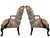Two Georgian-Style Mahogany Armchairs: Hand-carved solid mahogany frames featuring elegant cabriole front legs and...