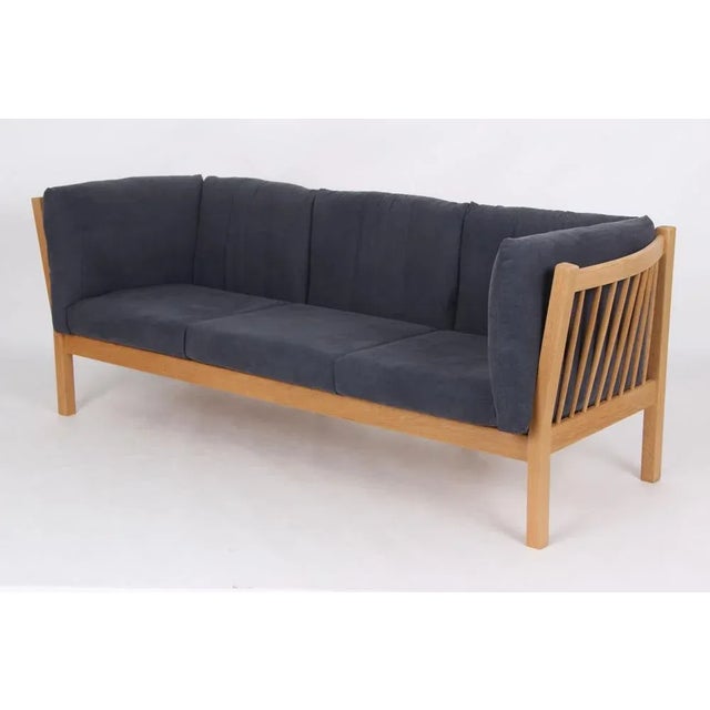 Andreas Hansen sofa model AH303. Design by Andreas Hansen and made at FRG. Andersensen's furniture factory. This model was...