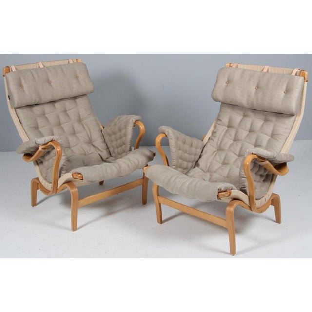 Bruno Mathsson Pernilla lounge chair with new canvas cushions Frame in beech. Made by DUX. This piece is attributed to the...