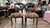 This pair of vintage Victorian style side chairs features classic balloon backs with hand-carved floral accents, elegant...