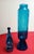 This beautiful turquoise blue, rocket shaped apothecary jar, has a circus tent lid and opic ribbed design body. Very...