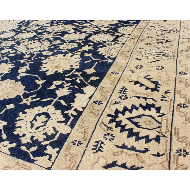 Textile Turkish Oushak Rug With Floral Design in Dark Blue, Cream and Light Brown For Sale - Image 7 of 9