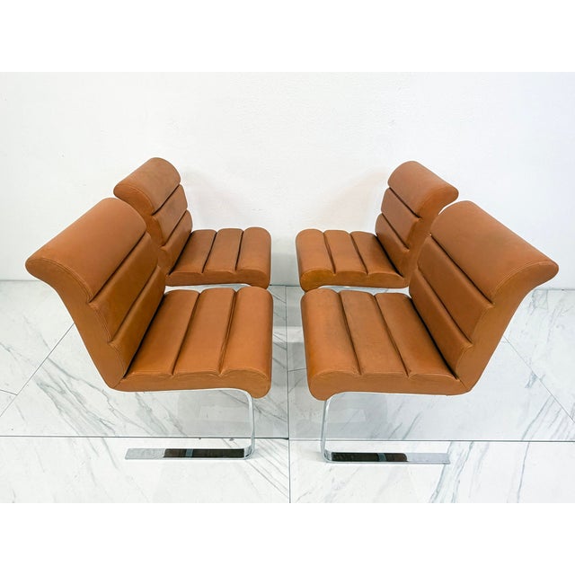 This set of four Lugano chairs by Mariani for the iconic Pace Collection is peak 1970s luxury: sculptural, grounded, and...