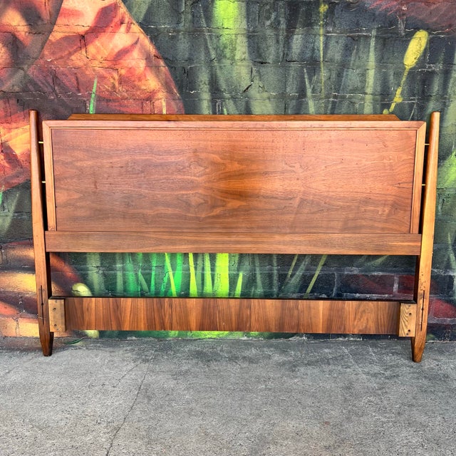 Full size headboard and footboard by Kipp Stewart for Drexel’s “Declaration” line. This headboard is constructed of walnut...