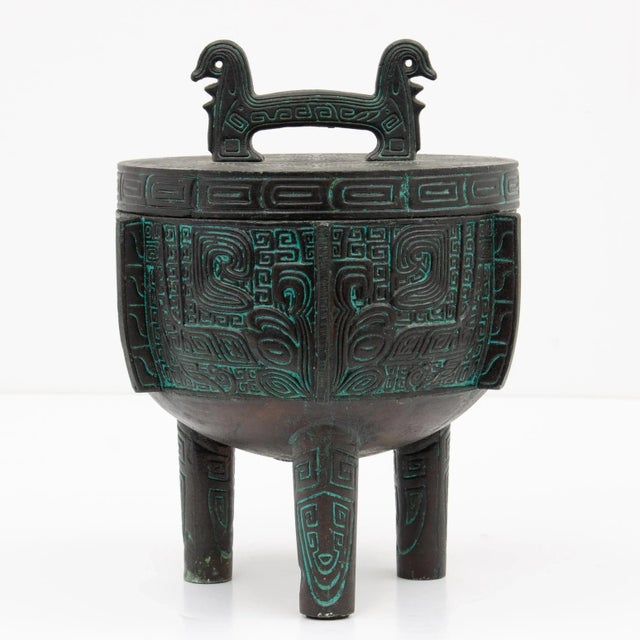 A Getz Brothers "Legacy Line" Chinese Shang Dynasty reproduction ice bucket with aqua interior lining. Circa 1960s. Often...