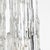 Clear glass light with a chrome base, the glass is textured and tapered from the top, all the way down to the base. A...