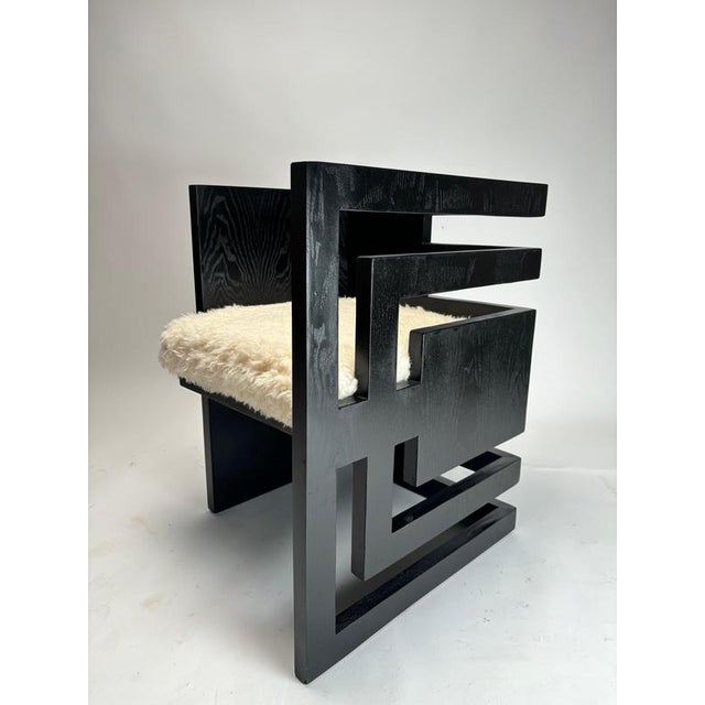 These armchairs are a contemporary design piece with a strongly sculptural and minimalist aesthetic, clearly referencing...