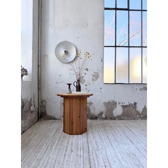 Vintage console or side table, a type of end table, in solid pine from the 1970s. In the style of perriand's mountain...