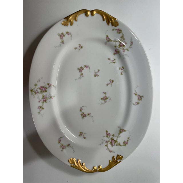 Beautiful vintage platter made by M. Redon in Limoges France. The platter measures 13 1/2 x 10 1/2“ and has a delicate...