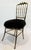1950's solid brass Chiavari chair from Italy. Seat has been updated with New Zealand black curly sheep skin covering....