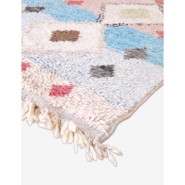 This Extra Long Moroccan Runner Rug is a graceful blend of subtle color and timeless tradition, handcrafted from 100%...