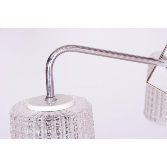Maker: drukov this three-arm chandelier, produced by the drukov company in brno, is a striking representative of...