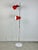 Amilux brand red floor lamp with 2 spots, entirely original chrome stem. Foot switch controlling 1 single spot or both...