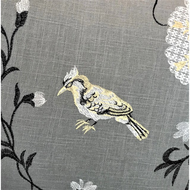 This elegant linen fabric is exquisitely embroidered with floral and avian motifs, and we have covered the seat and arms...