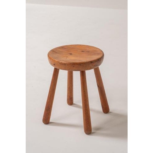 Beautiful wooden stool featuring a simple yet powerful design rooted in functionality and craftsmanship. The piece is made...
