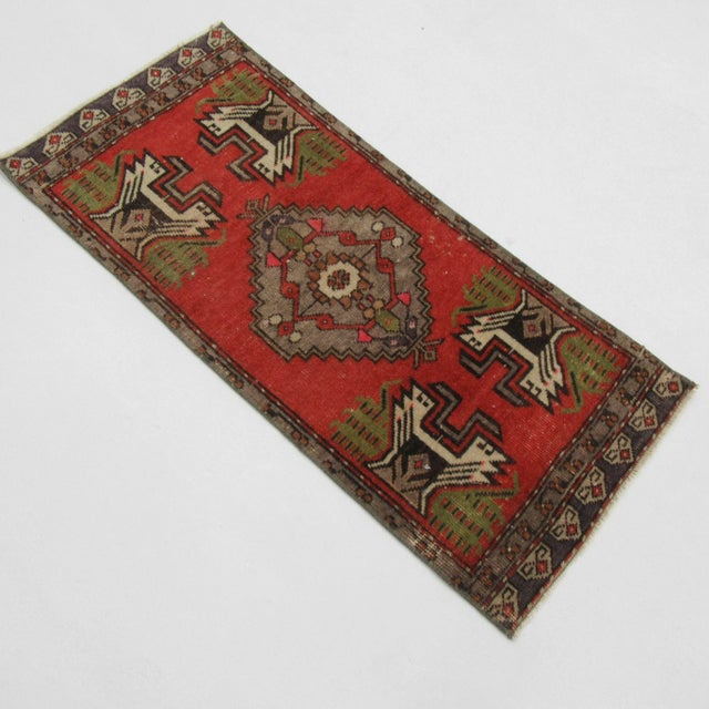 Vintage handknotted decorative mini rug from Konya region of Turkey. Approximately 50-60 years old. In very good condition.