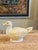 This is a charming vintage ceramic duck-shaped covered tureen or lidded serving dish, finished in glossy white with hand-...