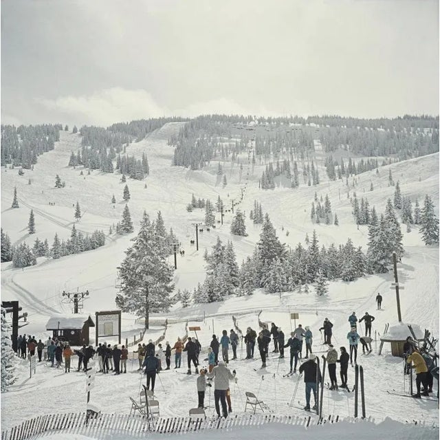 Skiing in Vail 1964 A group of skiers stand in line waiting for the ski lift in Vail, Colorado, USA, 1964. Photo by Slim...