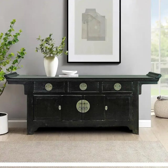 This later 19th century antique Chinese altar table was retrieved from Beijing and restored by the skilled local...