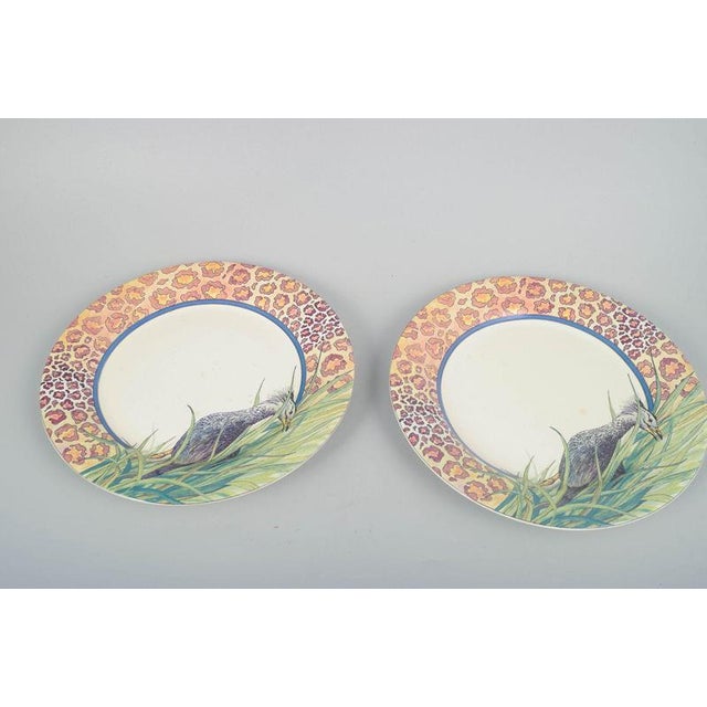 Gien, France “Savane” – Set of 2 large dinner plates, 1980s. Two decorative faience dinner plates by Gien in the...
