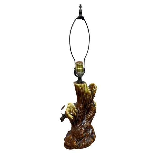 This Vintage MCM Ceramic Driftwood Yellow Brown Drip Glaze Tree Branch Table Lamp is a unique and stylish addition to any...