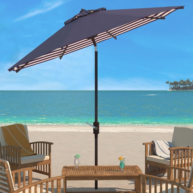 This eleven foot crank umbrella was inspired by the sunbathing terrace of Monacos Mediterranean overlook hotels. Embracing...