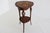 This elegant Art Nouveau side table, signed by Louis Majorelle and made in France circa 1900, is a fine example of the...