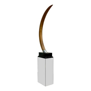 Vintage Sculptural Faux Tusk on Mirrored Pedestal For Sale