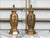 A pair of vintage Asian carved table lamps from the mid 20th century with pierced openwork foliage and floral motifs,...
