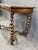Antique English barley twist entry table featuring beautifully turned spiral legs and a classic stretcher base. This...