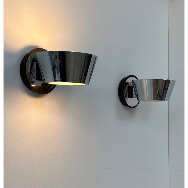 Pair of wall lights with a chrome frame and frosted glass diffuser, produced in France in the 1970s. Geometric and...