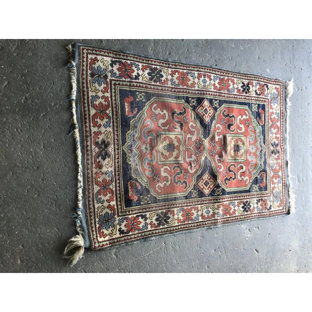 This vintage Hungarian kilim rug is from around the 1930s.