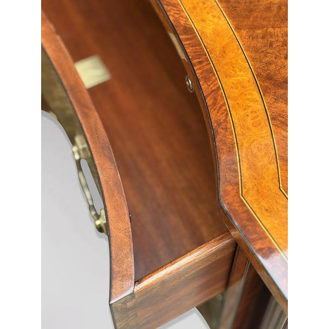 An elegant late 20th century commode by Brights of Nettlebed, a respected family firm renowned for fine English furniture...