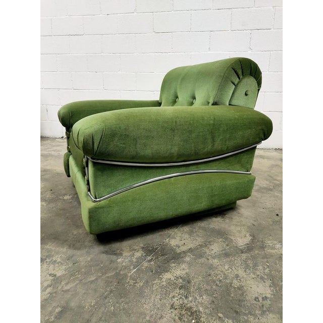 Armchairs with green velvet upholstery, chromed steel bars, in perfect condition, authentic vintage from the 70s....