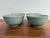 A beautiful set of four Chinese celadon rice bowls with a subtle lotus and carp motif. Classic and timeless pieces. Most...