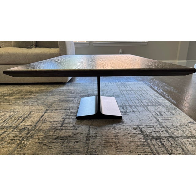 The table by modern design visionary John Birch reimagines the utilitarian I-beam support structure in a sleek, sculptural...