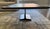 The table by modern design visionary John Birch reimagines the utilitarian I-beam support structure in a sleek, sculptural...